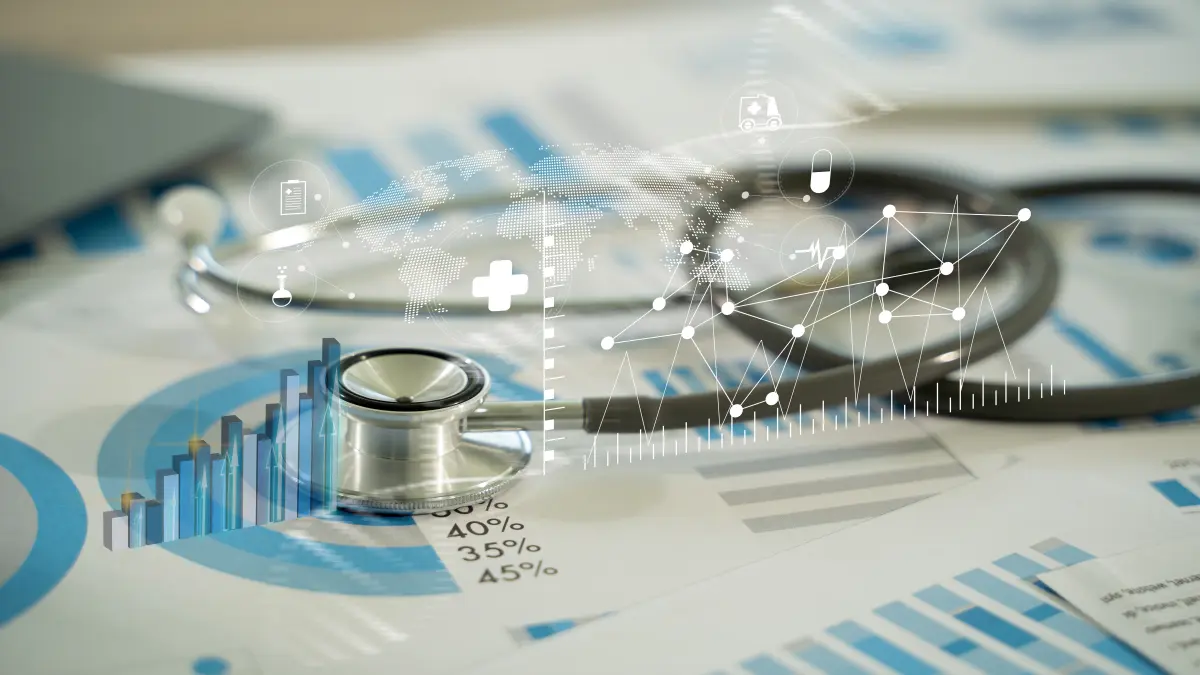 Stethoskop mit Unterlagen und Zahlen symbolisch für Krankenhausreform