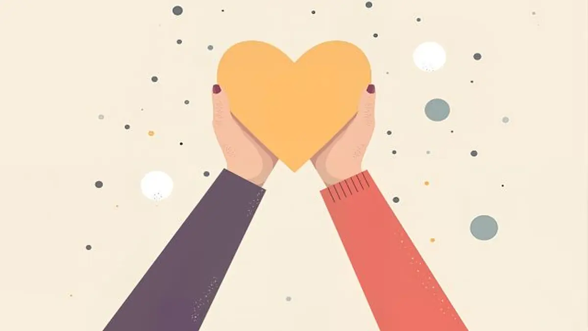 Zwei Hände halten gemeinsam ein gelbes Herz vor einem Hintergrund mit dekorativen Punkten.