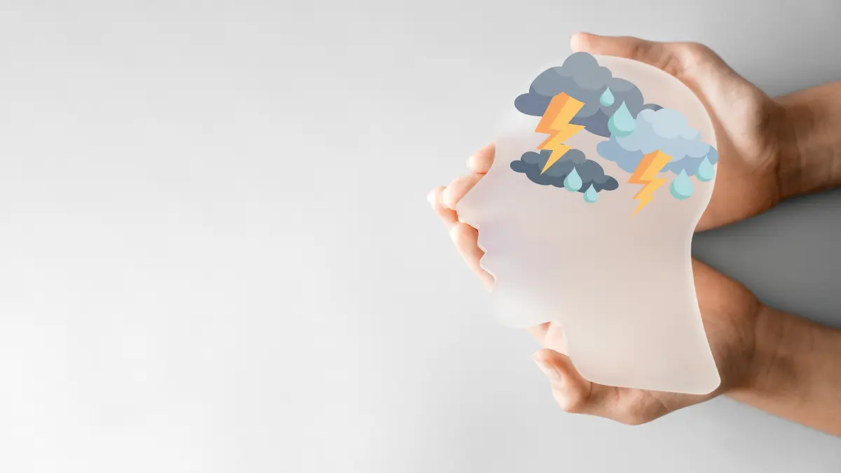 Illustration eines Kopfes mit Gewitterwolken, symbolisiert Epilepsie, Anfallsmonitoring und Therapieoptionen.
